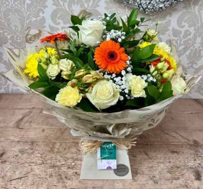 Sunshine Delight Bouquet - A bright and joyful bouquet with orange gerberas and yellow blooms, wrapped in lace-like material, perfect for brightening anyone's day.