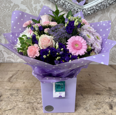 Lilac & Pink Hand Tied - A beautiful hand tied of lilac and pink fresh flowers, suitable for any occasion.